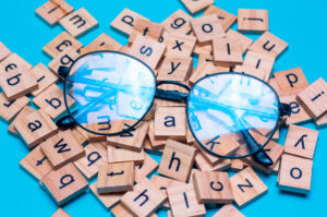 English alphabet made of square wooden tiles with the English al